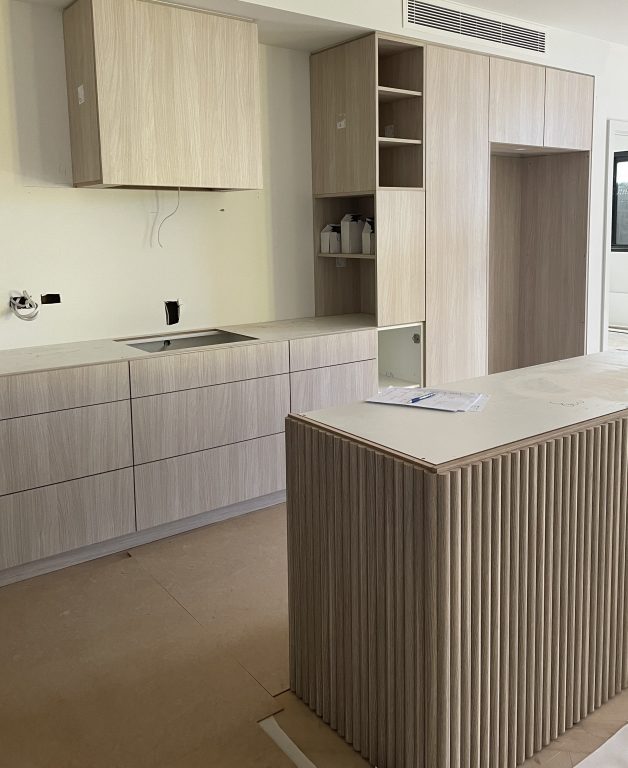 Modern kitchen apartment being constructed in Fairway Carindale.